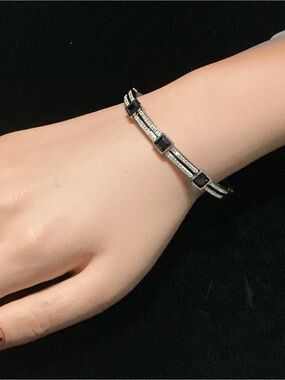 Stainless Steel  Bangle can fit up to 8in.